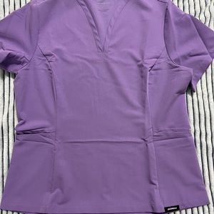 Jaanuu NWOT Women's Top L Lilac Scrub Top Pockets Stretch Knit